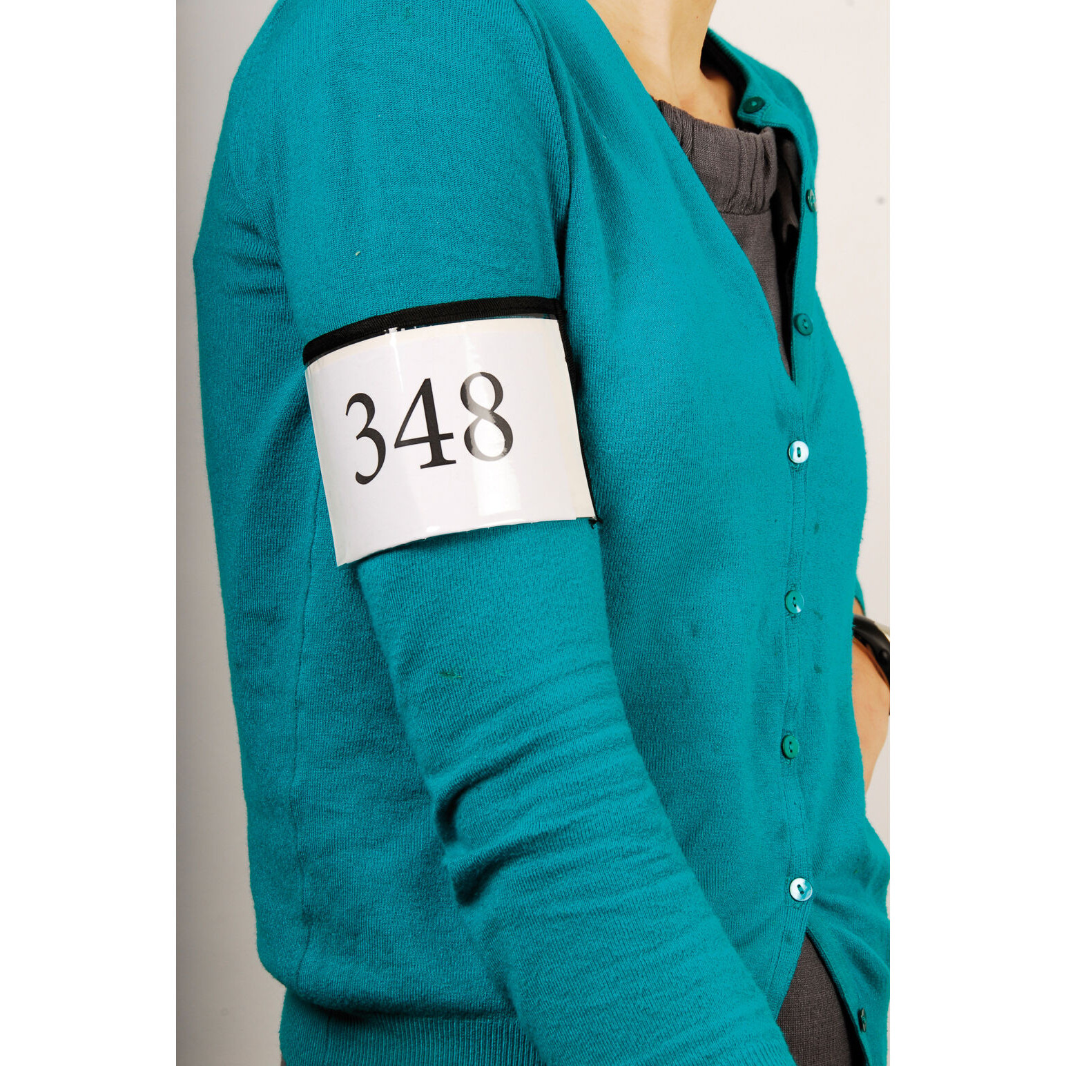 Opaka na numer startowy Armband Number Holder